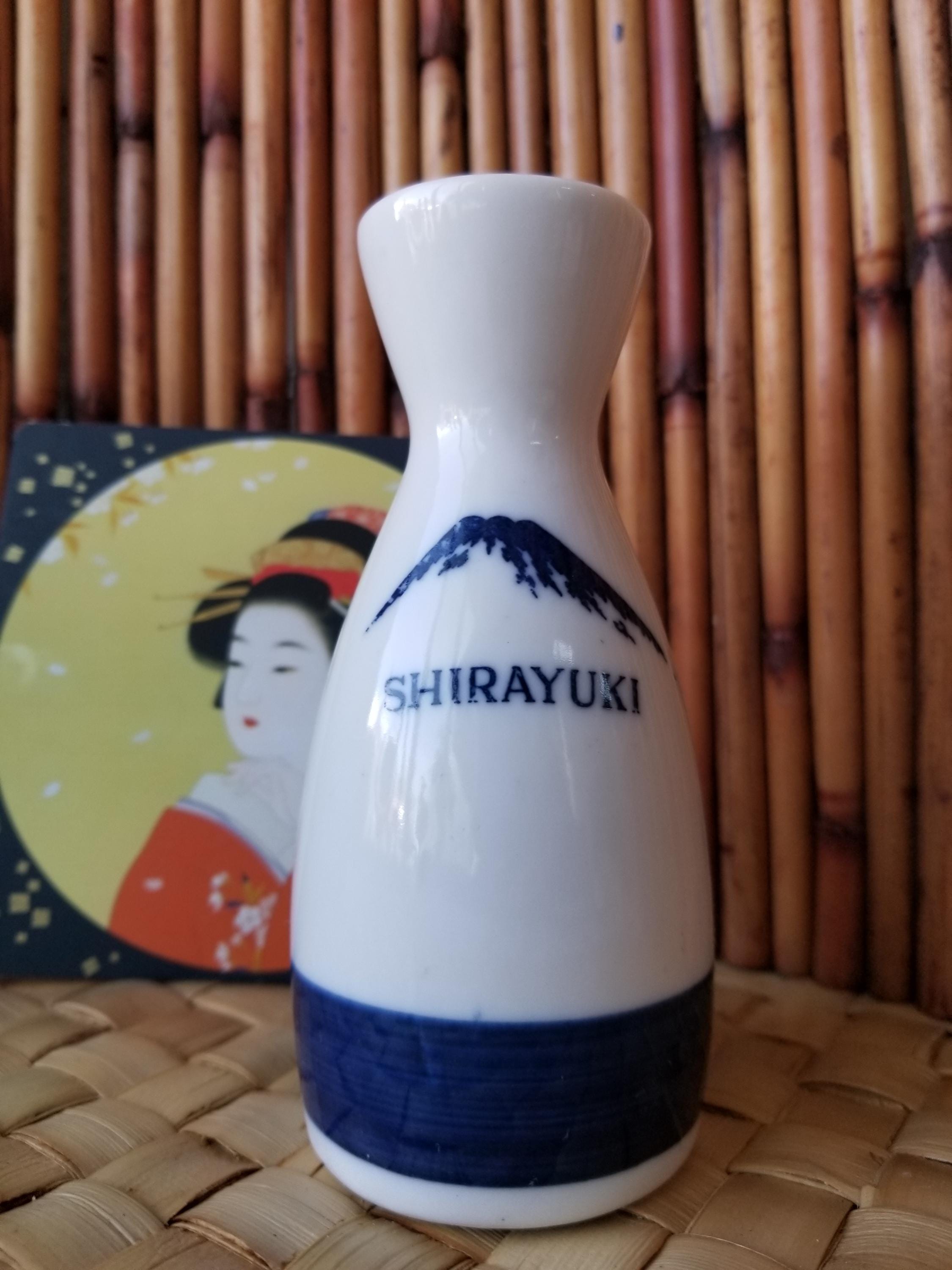 Cobalt and White Shirayuki Sake Pitcher From Japan. This Porcelain