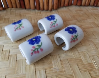 Gorgeous set of four Cobalt, pink and white porcelain Chopstick rests. These round chopstick rests are versatile in their design.