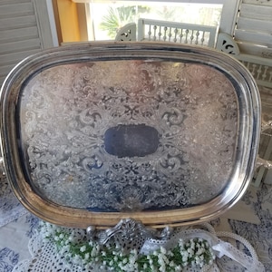Beautiful vintage Silver Plate platter. This lovely aged heavy silver vintage rectangular serving tray has two substantial handles.