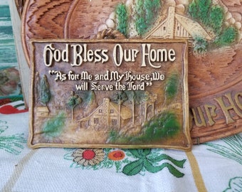 Charming mid-century God bless our home resin wall plaque. This sweet wall plaque asks for a blessing and has scripture from Joshua.