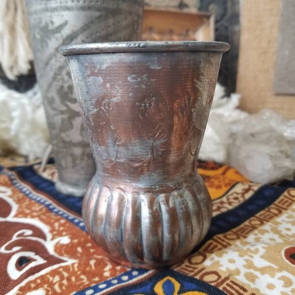 Fabulous antique copper vessel from Egypt. This Charming copper vessel from the Dark Continent makes for wonderful bohemian display element.