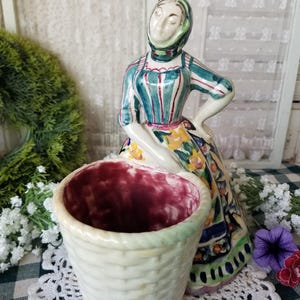 Gorgeous vintage Portuguese Majolica Pottery planter. This colorfully attired peasant woman echoes quintessential old Portugal lifestyle.