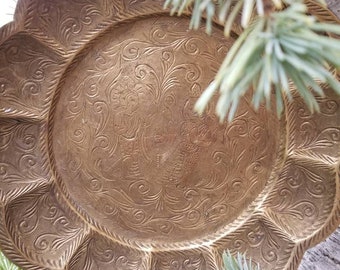 Gorgeous hand stamped Indian platter. This remarkable scalloped Edge plate has been hand stamped with images of princes and princesses.
