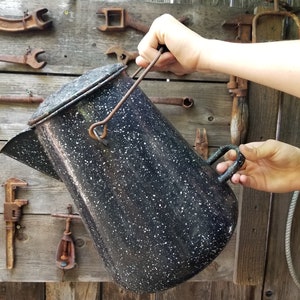 Huge speckled black enamelware Navy coffee pot. This 2 gallon black enamelware pot will certainly show well in your Farmhouse kitchen.