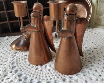 Exquisite Peggy Page hand wrought copper angel candlesticks. These two modernist style Mexico solid copper candlesticks  are remarkable.