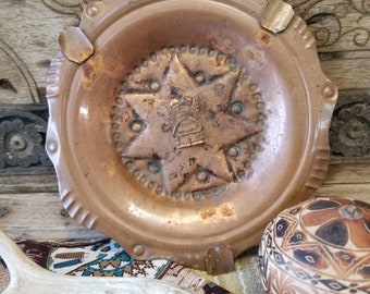 Hand hammered rustic repousse copper ashtray. This aged, patinated tarnished ashtray is a great copper Aztec inspired Relic.