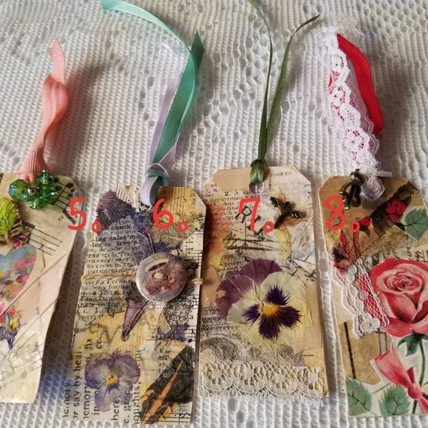 Beautiful hand crafted junk journal tags. Each one is unique in an array of designs. I decoupaged each using a variety of paper and others.