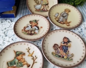 Adorable MJ Hummel miniature collectors plate series. Each of these  sweet Goebel MJ Hummel reproduction tiny plates come in their box