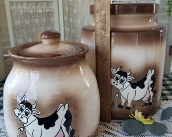 Udderly delightful Vintage farmhouse canister cookie jars. Your choice of 2 large and massive hand-painted Holstein cow cookie jars.