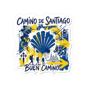 May include: A sticker with a blue and yellow design featuring the words "Camino de Santiago" and "Buen Camino." The design includes a scallop shell, silhouettes of pilgrims, a cross, and a cathedral.