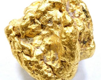 May include: A large, irregularly shaped nugget of raw gold. The gold is a bright, shiny yellow color and has a rough, textured surface.