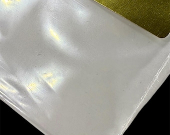 May include: A small plastic bag with a gold label that reads "Canadian BC Natural Gold Nuggets G25 x 20". The bag contains a small pile of gold nuggets.
