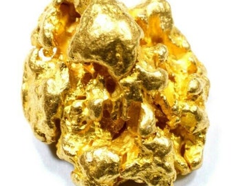 May include: A large, irregular nugget of raw gold. The gold has a rough, textured surface and is a bright, shiny yellow color.