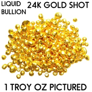 Puede incluir: Primer plano de un mont&oacute;n de oro de 24 quilates, tambi&eacute;n conocido como lingote de oro l&iacute;quido. La imagen muestra 1 onza troy de oro.