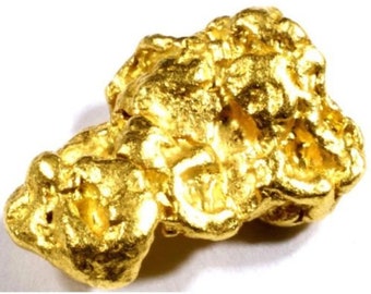 May include: A large, irregular nugget of raw gold. The gold has a rough, textured surface and is a bright, shiny yellow color.