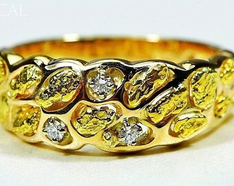 May include: A gold ring with a unique design featuring small pieces of gold set into the band. The ring is accented with small diamonds.