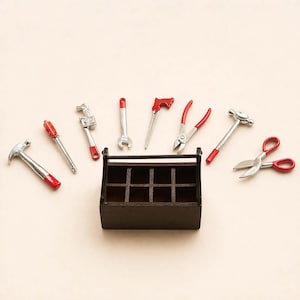 May include: A set of miniature tools, including a hammer, screwdriver, spanner, saw, pliers, and scissors, with red detailing. The tools surround a dark brown wooden toolbox with several compartments. The tools are made of metal.