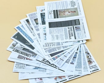 May include: A stack of newspapers with headlines such as "Take Care of Yourself", "The Newspaper Paris", "London Times", "Weekend Life", "Business", "Voices", "Fortune Favors the Brave", "Life", "There Better", "Spo", "Rue", "Patron of the Moon", "Refain from Excess", "Shanghai Set to Boost Use of AI in Medicine", "Yatai's Sapu has gone to register with CSL", "The Newspaper Paris" and "Weekend Life".
