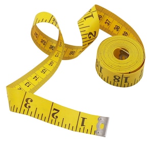 May include: A yellow measuring tape with black numbers, rolled up and ready to use. The tape measures up to 40 inches.
