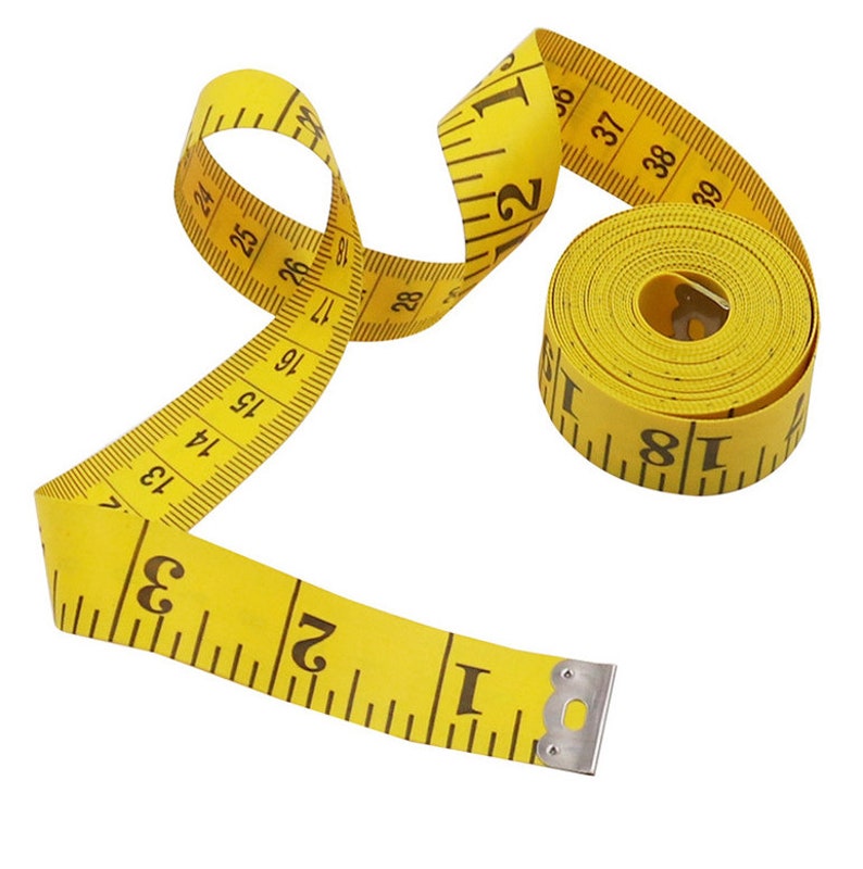 May include: A yellow measuring tape with black numbers, rolled up and ready to use. The tape measures up to 40 inches.