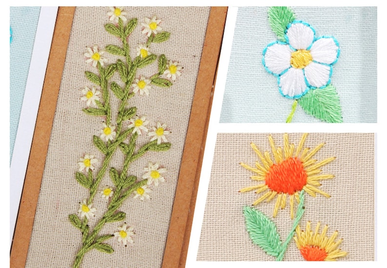 May include: Three embroidered floral designs on a beige fabric background. The first design is a cluster of white daisies with green stems and leaves. The second design is a single white flower with a yellow centre and blue outline. The third design is a yellow sunflower with an orange centre and green leaves.