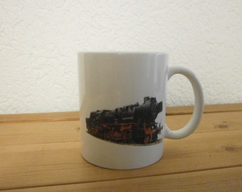 Cup with steam locomotive BR52