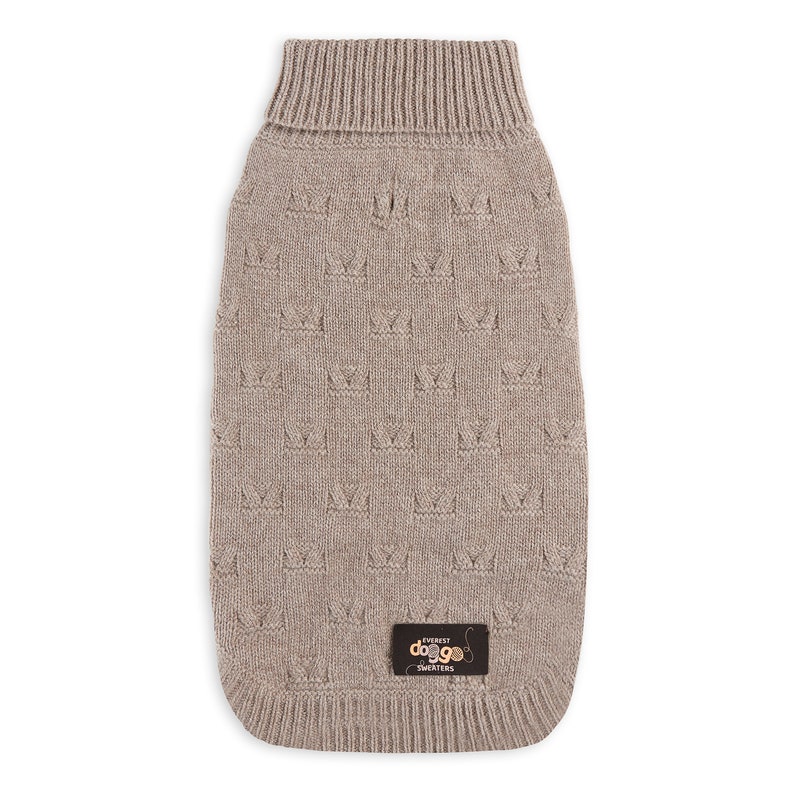 May include: A beige knitted dog sweater with a crown pattern and a small brown label that says "Everest Doggo Sweaters".