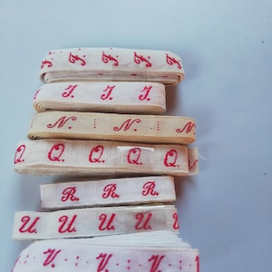 Etiqueta de lavanderia - letras individuais, monogramas aproximadamente 1940, símbolo de lavanderia vintage raridade antiga.