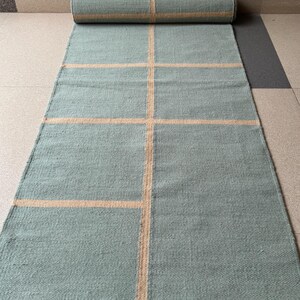 rustic farmhouse runner rug, artisan striped rug, handmade stripe wool runner, minimal stripe wool rug, transitional decor runner, sustainable stair rug, eco conscious wool runner, artisanal home rug, handcrafted wool runner rug, organic wool runner, traditional wool runner, contemporary wool runner, earthy striped rug, natural brown rug runner, soft wool runner rug, strong wool runner rug, durable stair rug, corridor runner rug, narrow entryway runner,