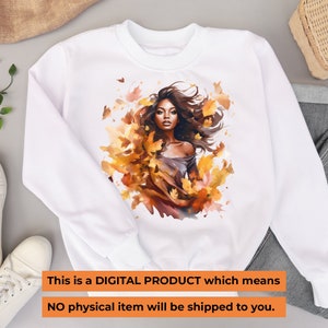 May include: White sweatshirt featuring a watercolor illustration of a woman surrounded by autumn leaves in shades of orange and yellow. The text at the bottom reads: "This is a DIGITAL PRODUCT which means NO physical item will be shipped to you."