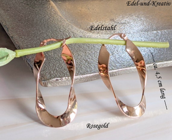 Steel & rose gold twist earrings Steel & rose gold twist earrings