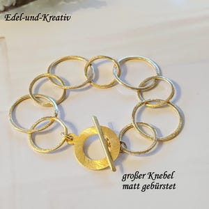 Vergulde schakelarmband, grote en kleine gouden ringen, mat geborsteld, ringarmband, statementarmband, XL-armband, 3 cirkels, knevelsluiting
