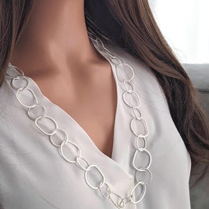 long silver chain, unusual, silver-plated necklace, link chain, large rings, modern eyelet chain, ring elements, gift, wrap chain, matte silver