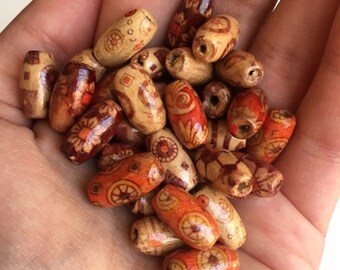 100 OVAL WOOD BEADS ASSORTED PATTERNS 15MM