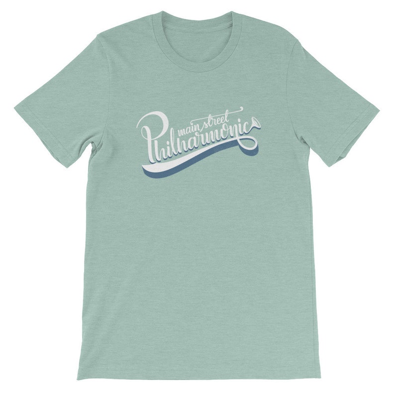 May include: A light blue t-shirt with a white graphic that says "Main Street Philharmonic" in a stylized font with a musical note.