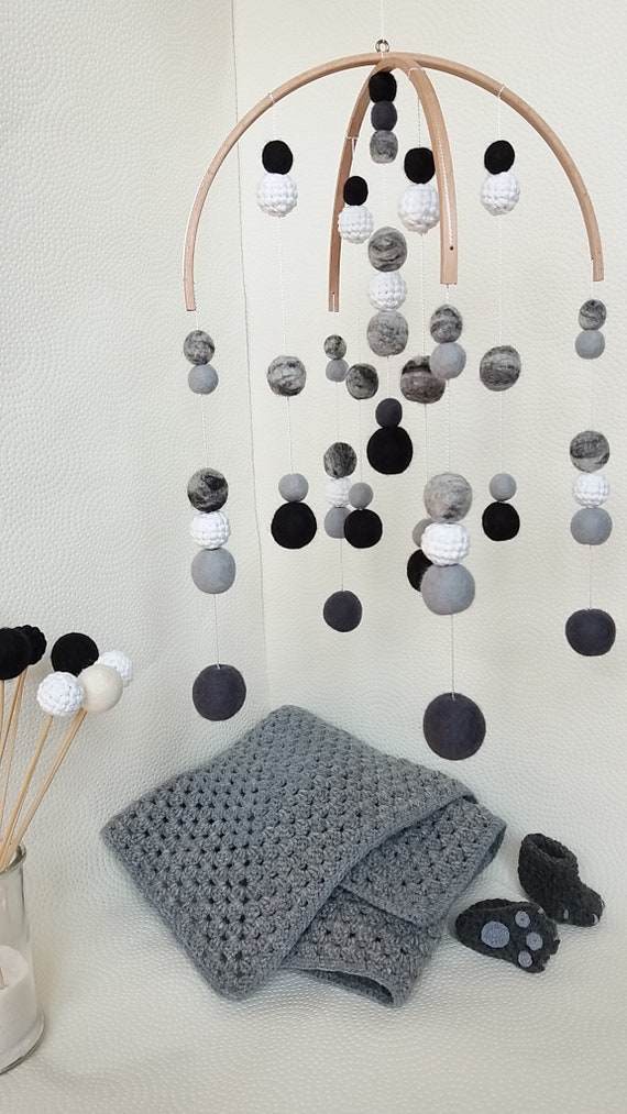 black and white cot mobile