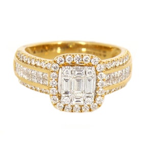 May include: A gold ring with a square-shaped diamond center stone surrounded by smaller diamonds. The band is also set with diamonds.
