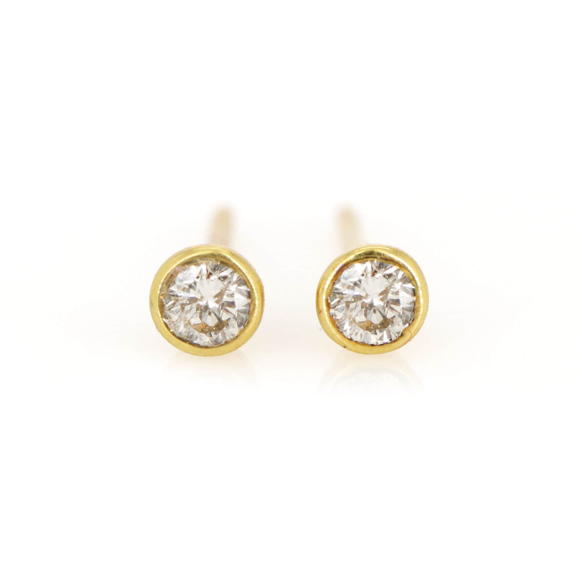 Shop Dazzling Triangle Diamond Stud Earrings Online | CaratLane US