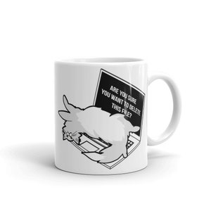 May include: White ceramic mug with a black and white illustration of a cat lying on a laptop. The laptop screen displays the text "Are you sure you want to delete this file?"