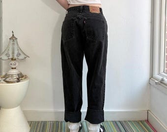 Vintage 550 low rise relaxed fit faded black wash Levi’s jeans W27