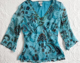 Top babydoll azul con estampado floral paisley y mangas anchas, 100% seda, de Fashion Bug, talla XL.