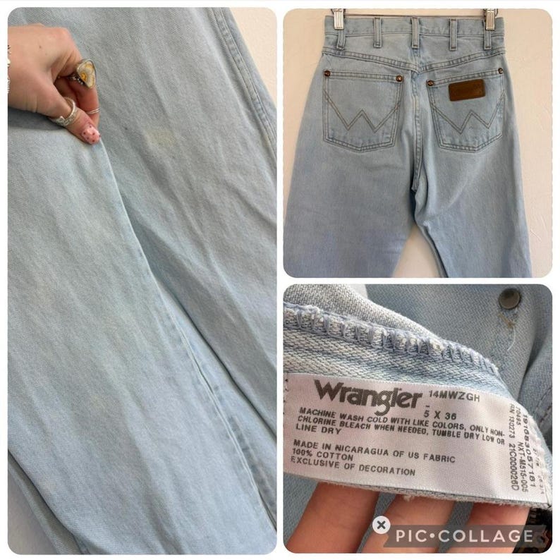 Op de afbeelding: Lichtblauwe Wrangler-jeans. De jeans hebben een klassiek ontwerp met vijf zakken, een bruine leren patch en het Wrangler-logo op de achterzakken. Het label luidt "100% katoen" en "Gemaakt in Nicaragua van Amerikaanse stof". De jeans zijn maat 5 x 36.