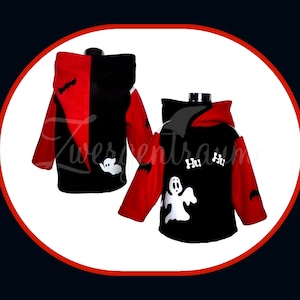 Könnte beinhalten: Zwei schwarze und rote Kapuzenpullover mit einem Geister- und Fledermausdesign. Ein Pullover hat den Text "Hu Hu" auf der Vorderseite.