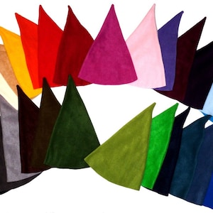 May include: A collection of 20 felt elf hats in various colors, including red, green, blue, purple, and yellow. The hats are arranged in a semi-circle, with the points of the hats facing outwards.