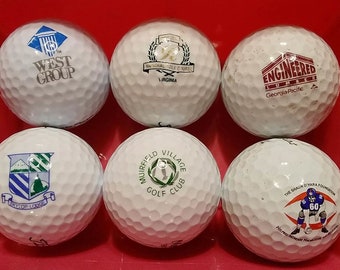 6 Used Collectible Advertisment Logo Golf Balls