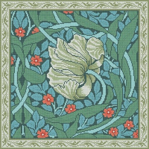 May include: A green and blue floral pattern with a large white flower in the center. The pattern is surrounded by a border of green and white.