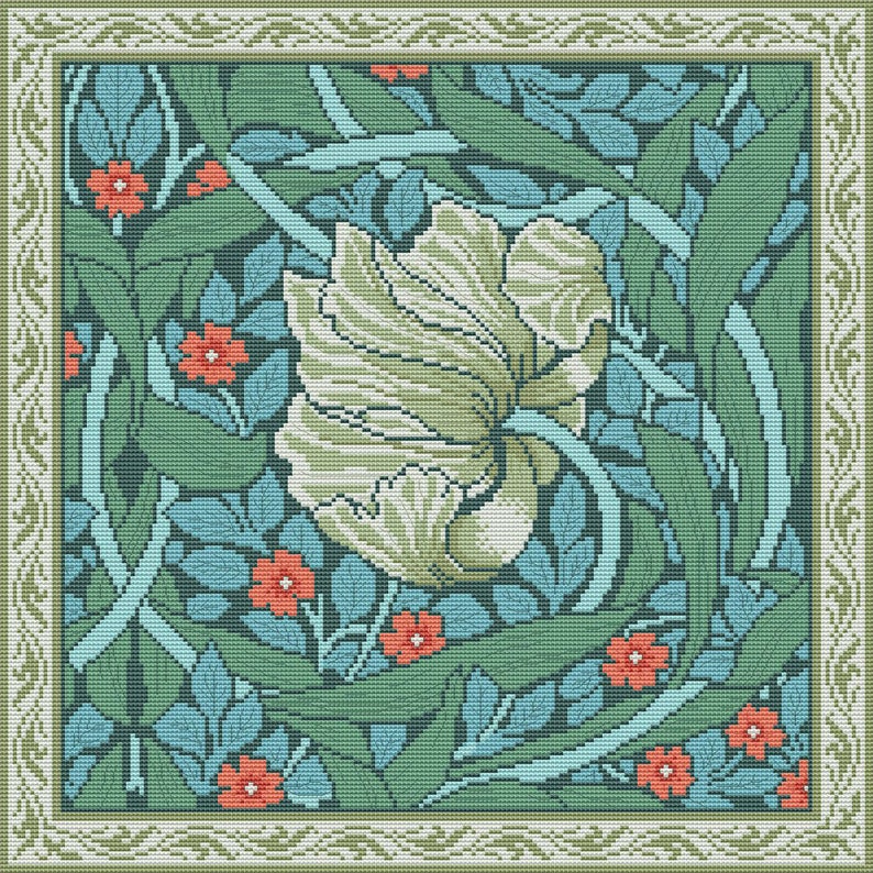 May include: A green and blue floral pattern with a large white flower in the center. The pattern is surrounded by a border of green and white.