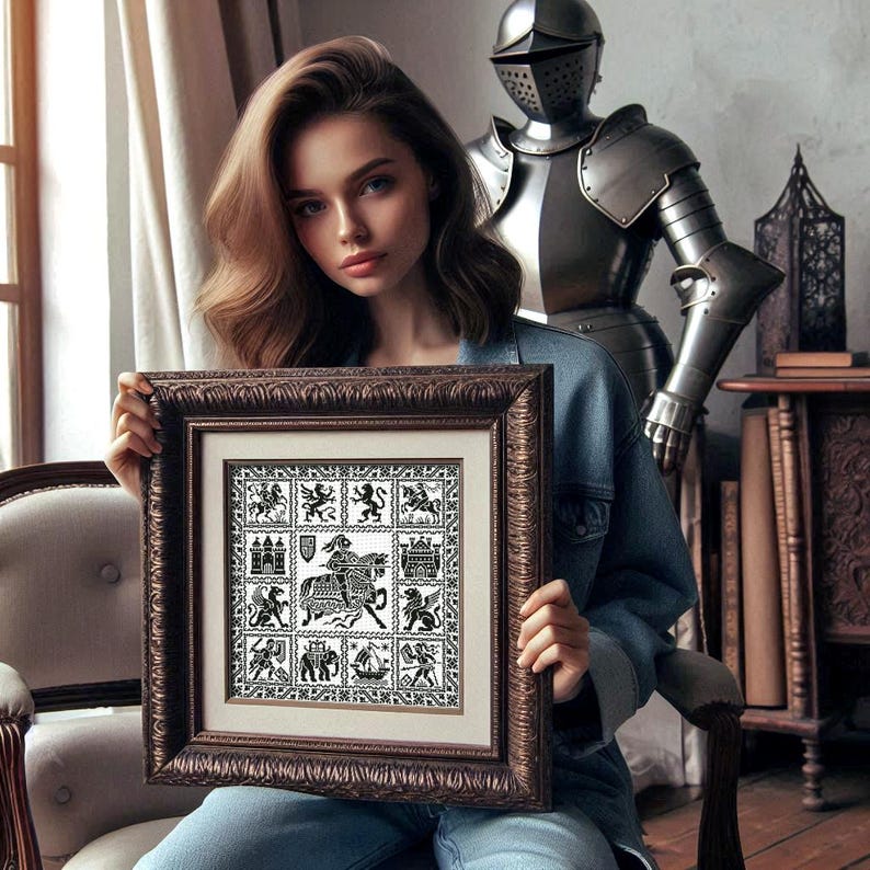 May include: A framed artwork with a brown ornate frame. The artwork features a black and white medieval design with various heraldic symbols and figures. The frame is held by a person wearing a denim jacket.