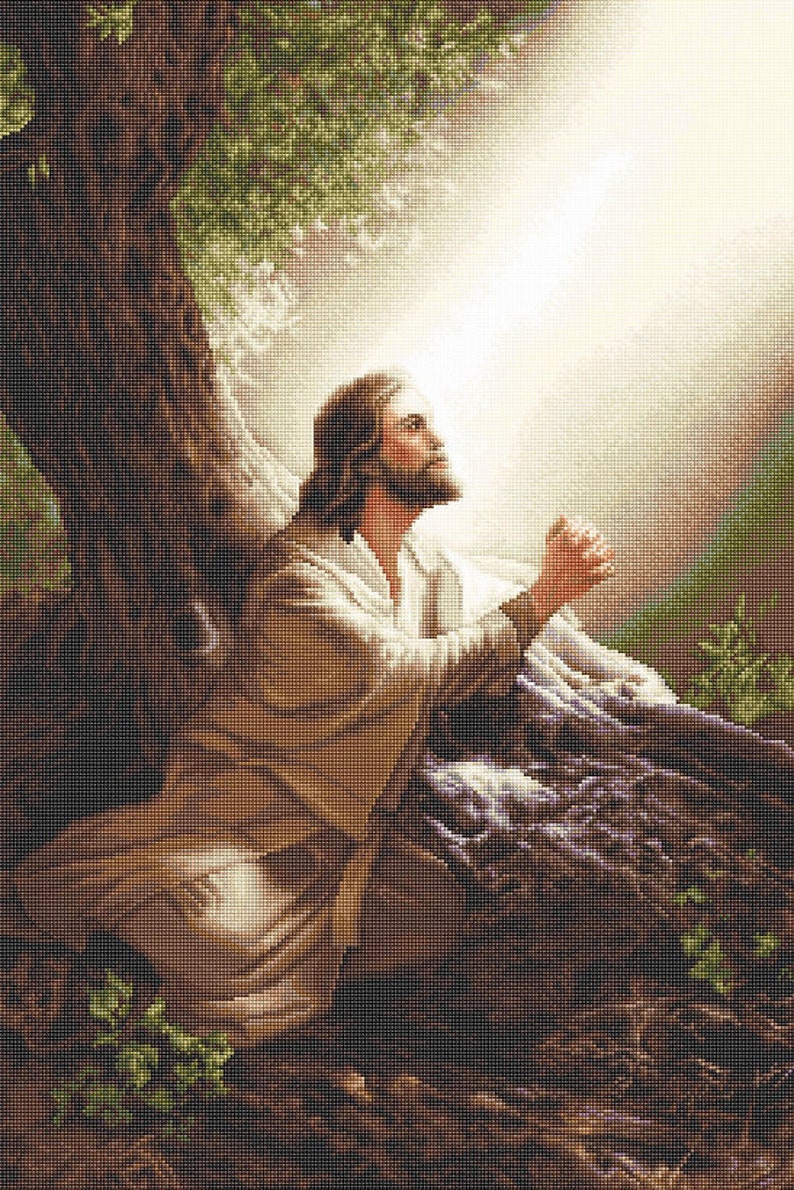 May include: A painting depicting a man in a white robe kneeling and praying with his hands clasped together. He is looking up at a bright light shining through the trees. The scene is set in a forest with a large tree trunk behind him.