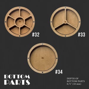 May include: Three wooden round tray bases with different compartment configurations. The bases are 0.71 inches deep. The bases are labeled #32, #33, and #34.